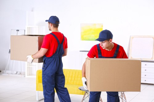 Man and van loading boxes for a transparent Hammersmith move quote