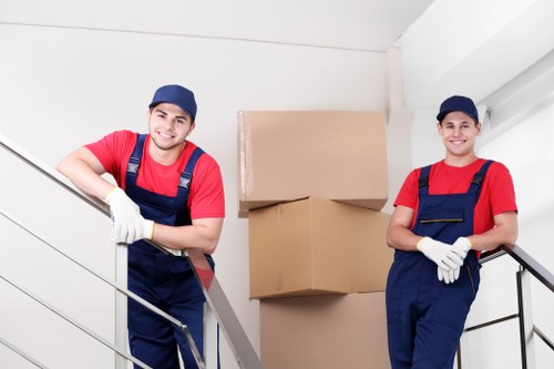 Removal team planning a move in a Hammersmith street