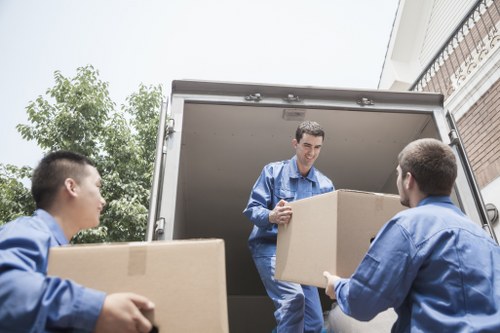 Moving staff using PPE during a safe house relocation