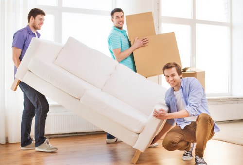 Packed boxes and furniture ready for a local home removal in Hammersmith