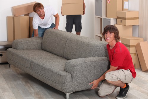 Professional movers managing a flat removal in west London