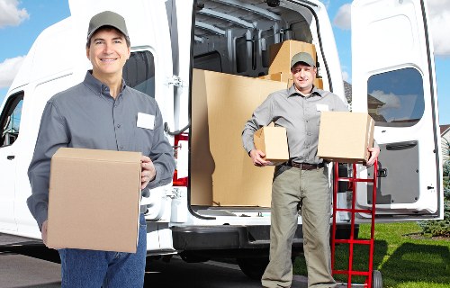 Boxes and furniture being loaded for a local move