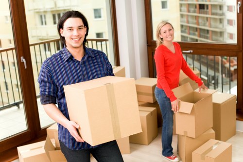 Packed boxes and furniture ready for transport